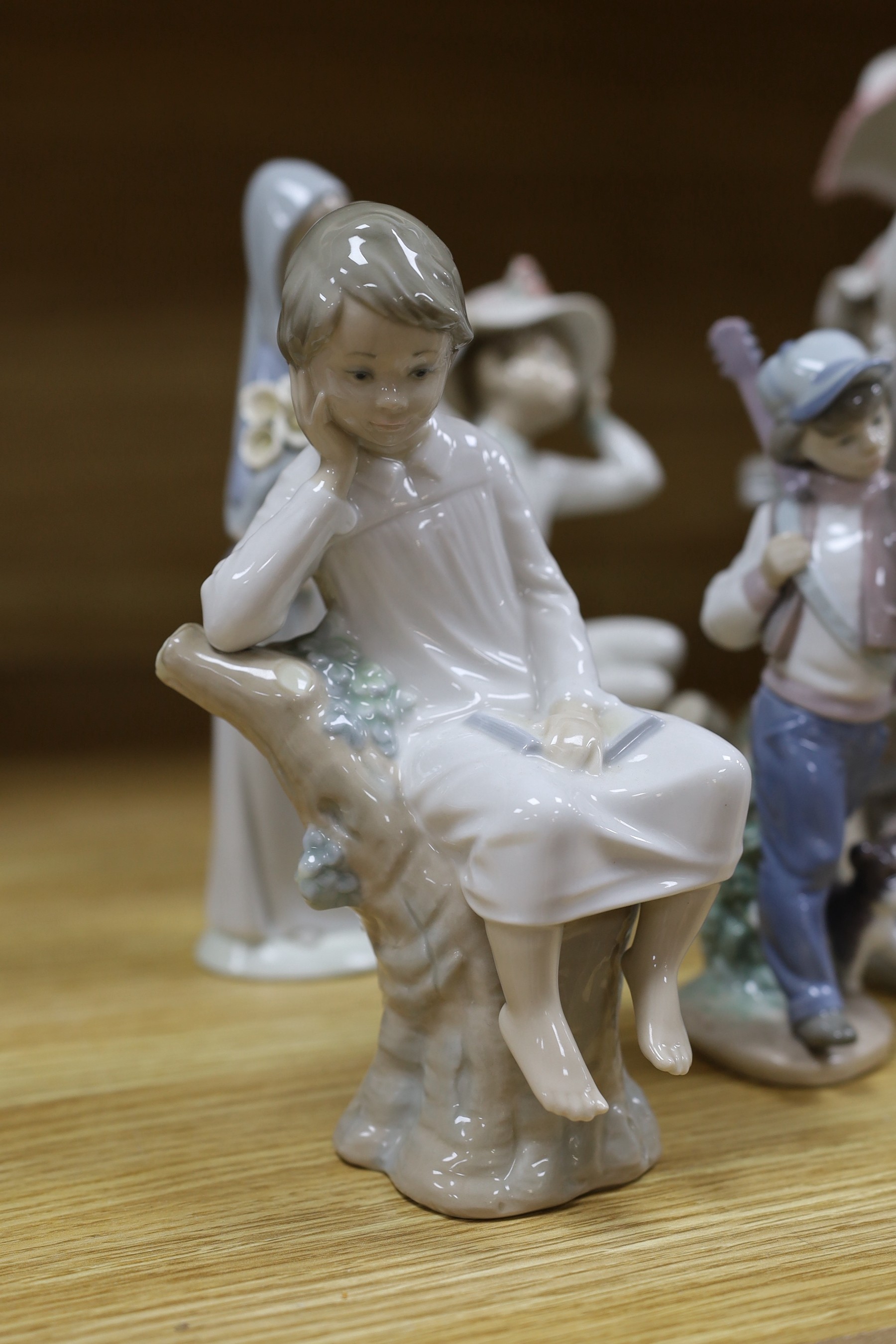 A selection of eight Lladro figures, tallest 33cm